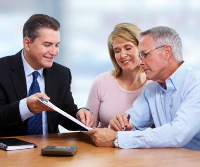 Financial advisor educates wealthy couple on smart tax planning strategies.