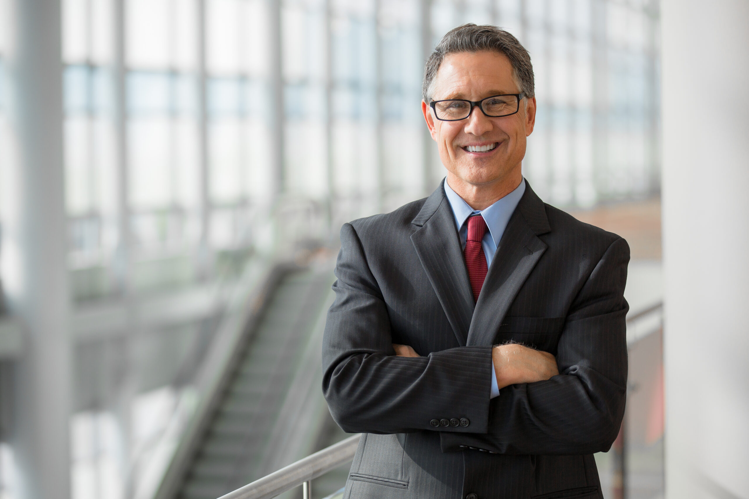 Portrait of a handsome CEO smiling Portrait of a handsome CEO smiling