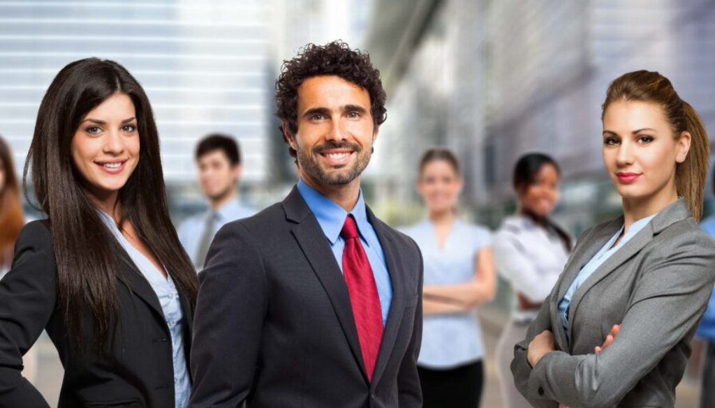 Several young confident professionals smile because they just learned to use LinkedIn Activities to Create Demand for Your Services