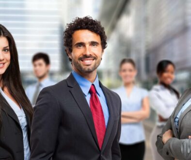 Several young confident professionals smile because they just learned to use LinkedIn Activities to Create Demand for Your Services