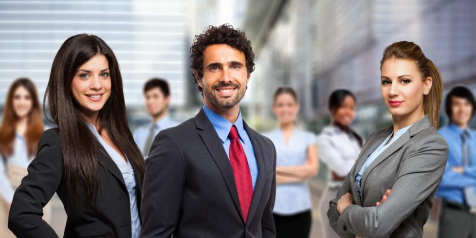 Several young confident professionals smile because they just learned to use LinkedIn Activities to Create Demand for Your Services