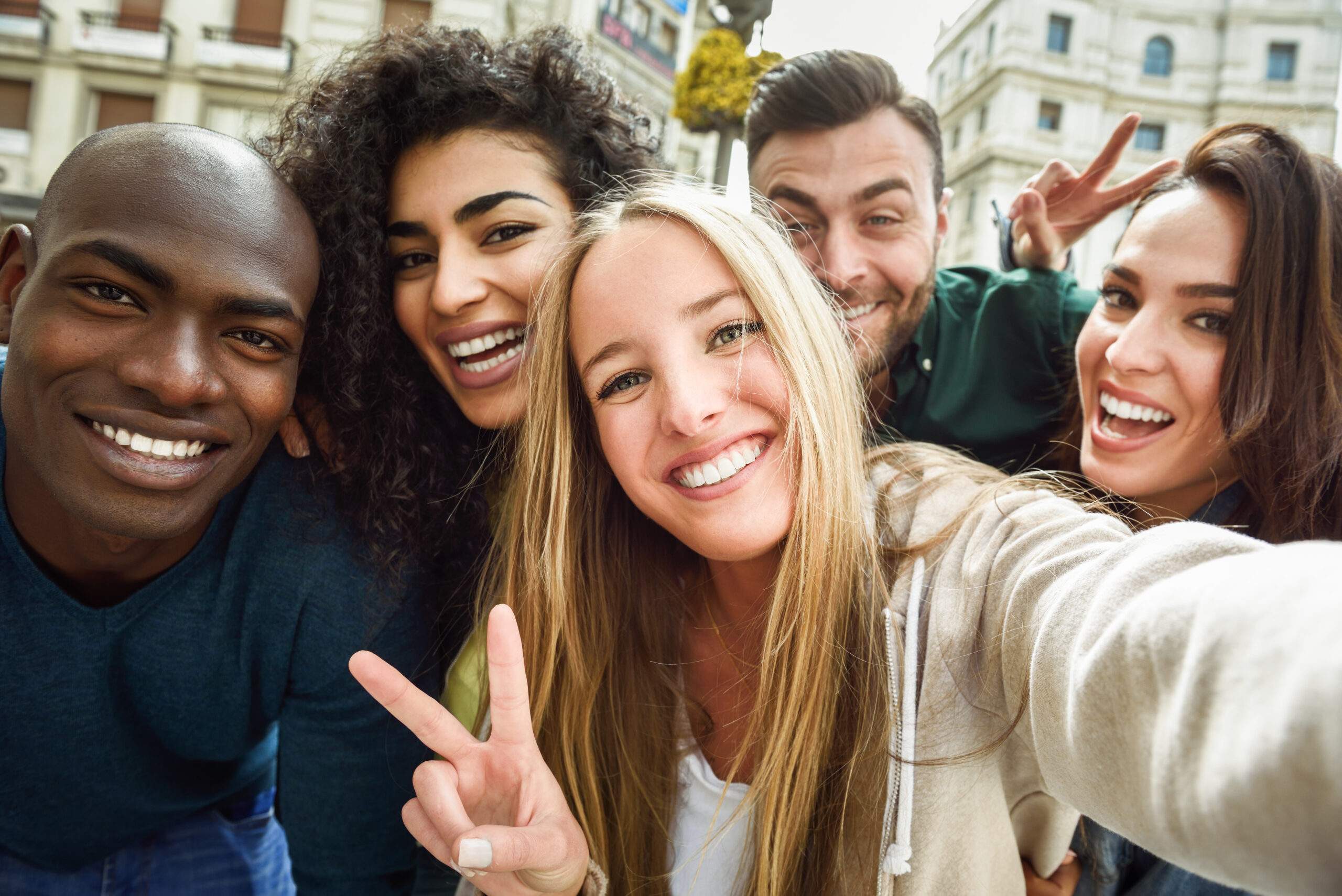 Group of young people excited to learn about exam and lab-free life insurance applications