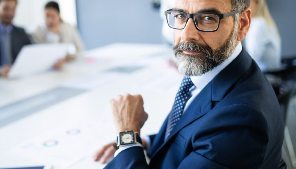 Middle aged business man in professional meeting