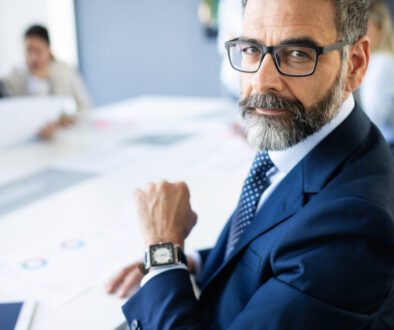 Middle aged business man in professional meeting