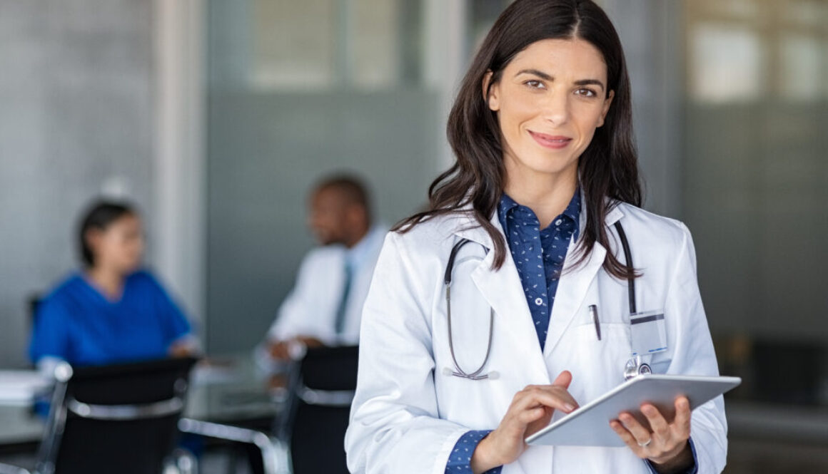 Doctor getting ready to complete a life insurance medical exam