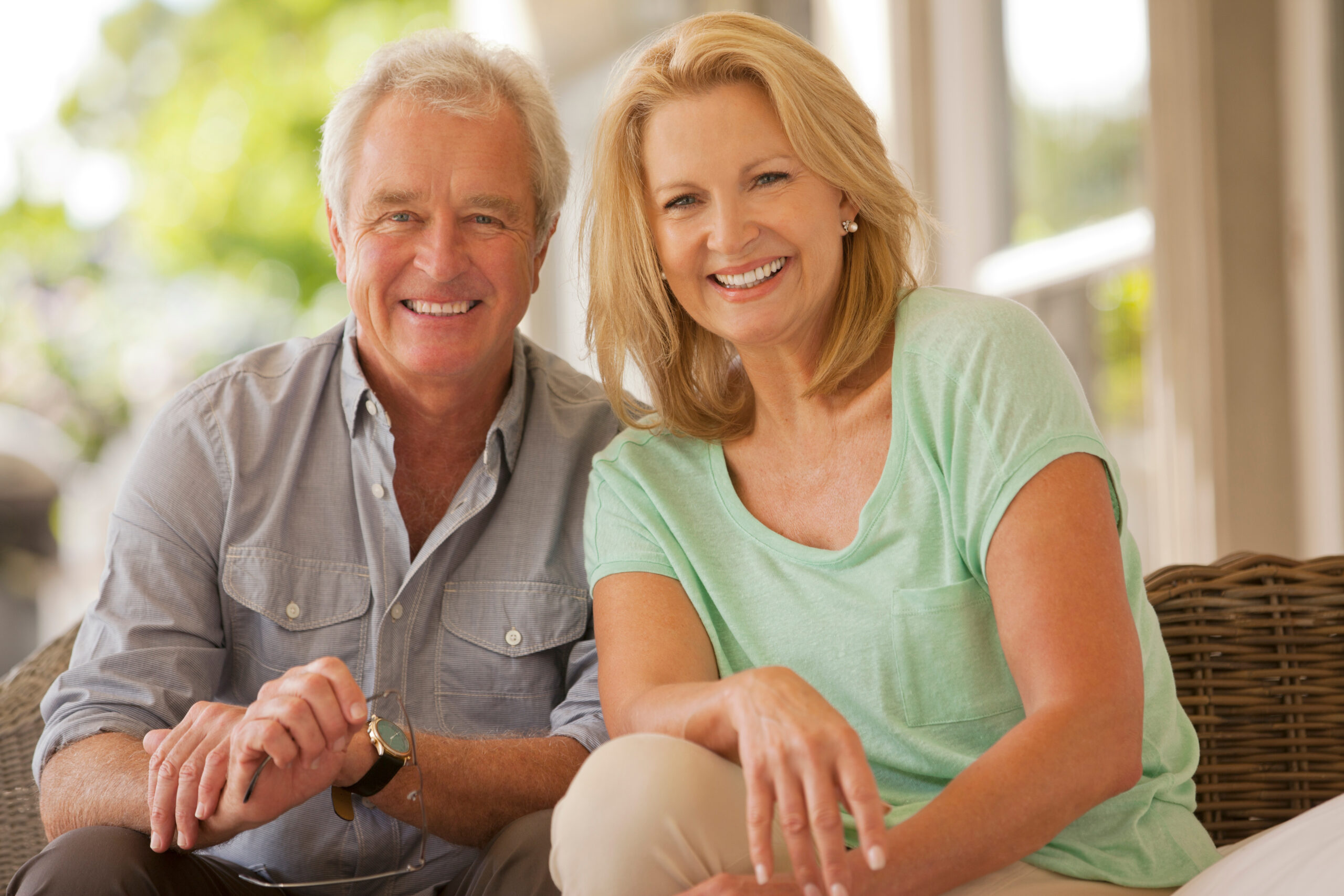 Older couple contemplating long term care insurance