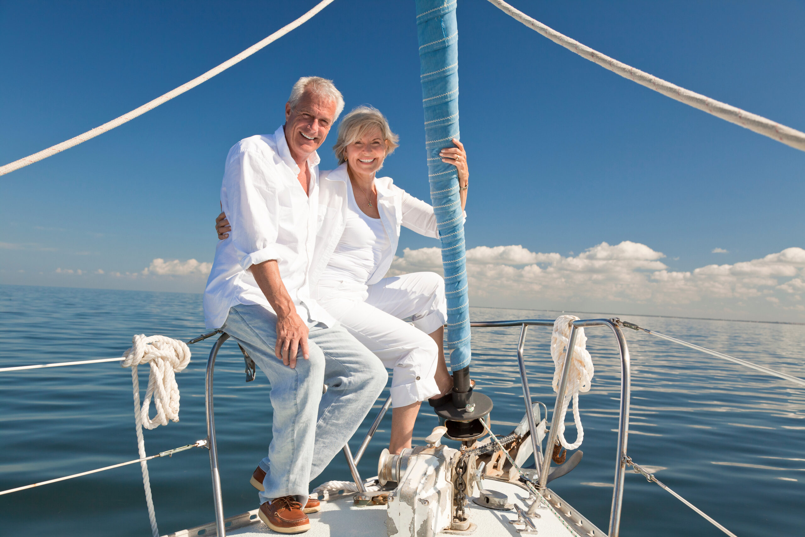 Happy Senior Couple on a Sail Boat