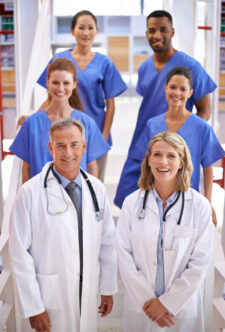 They will give you the best care possible. Portrait of a diverse team of medical professionals standing on a staircase in a hospital. Medical doctors providing underwriting solutions