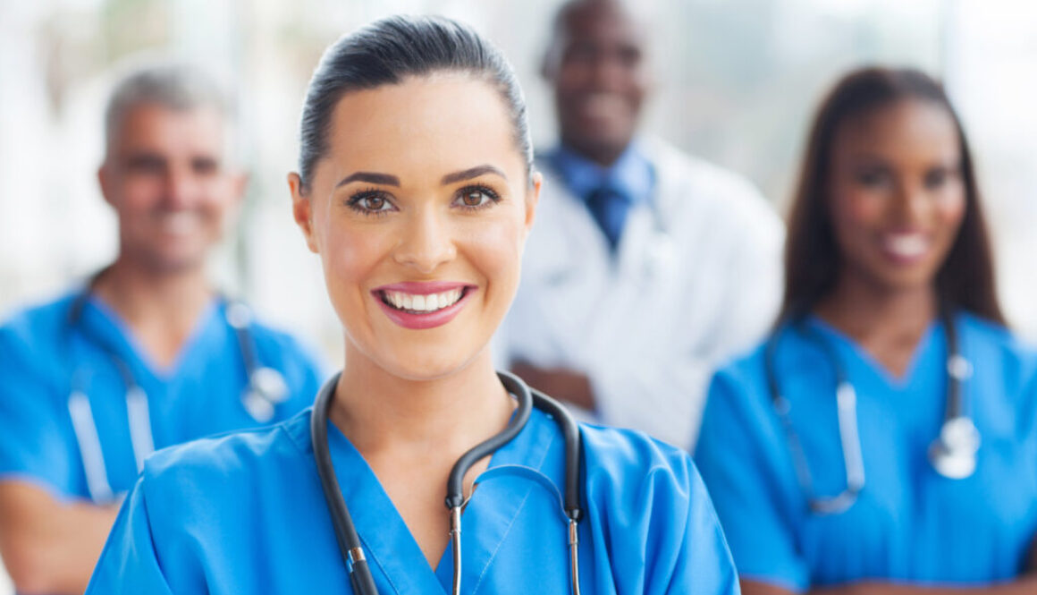 medical nurse and colleagues Young female nurse or doctor with stethoscope
