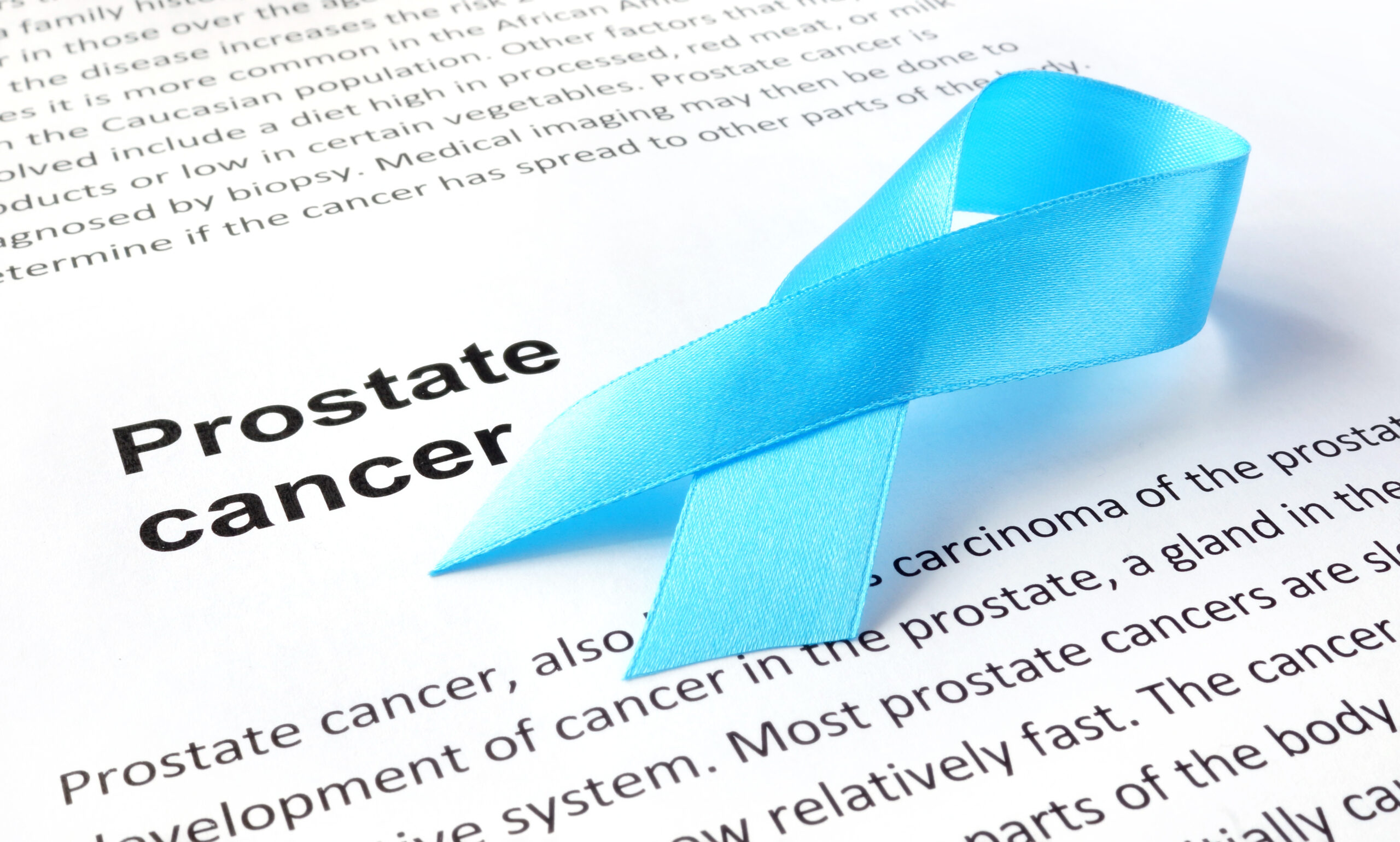 Paper with prostate cancer and light blue ribbon Prostate Cancer Graphic