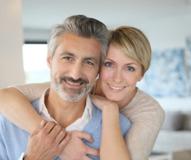 Middle aged couple buying long term care insurance